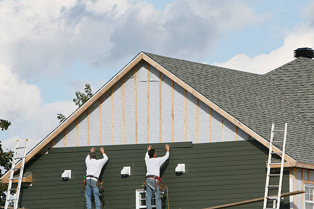 Professional Siding technician working in Madison, FL